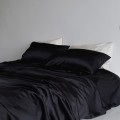 This black silk duvet cover set is awesome. No other word can describe it. No tax and quick delivery! What a bargain for such beauty. Packaging was great. Not just thrown together and shoved in a box.